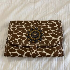 Giraffe Print Fold-Over Clutch with Decorative Medallion